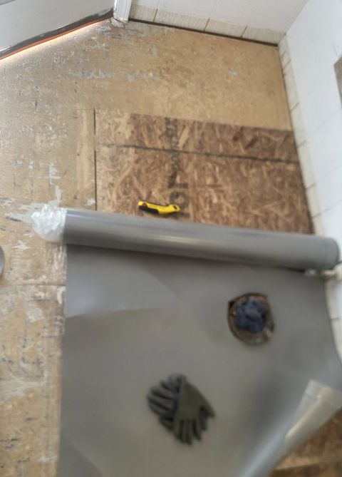 Bathroom floor opened up to the subfloor during the update